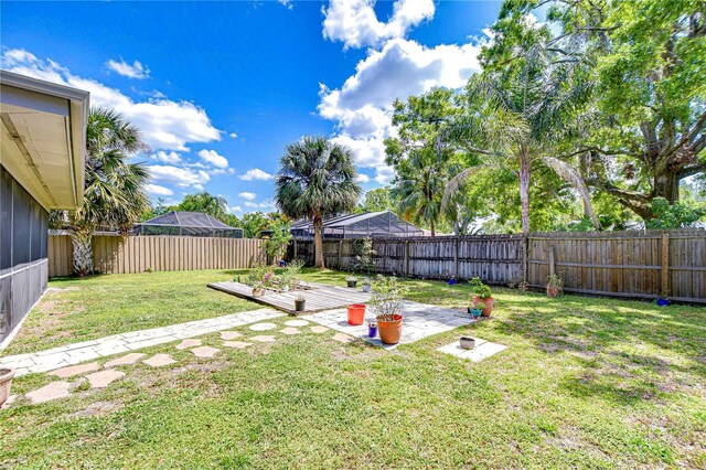 4110 Summerdale Dr, Tampa, FL 33624 - view of yard featuring a fenced backyard
