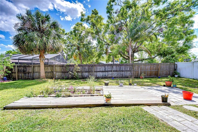 4110 Summerdale Dr, Tampa, FL 33624 - view of yard featuring a fenced backyard and a wooden deck