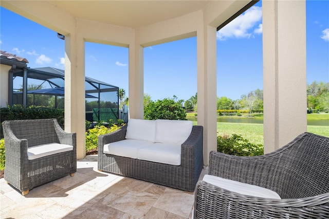 view of patio / terrace with glass enclosure