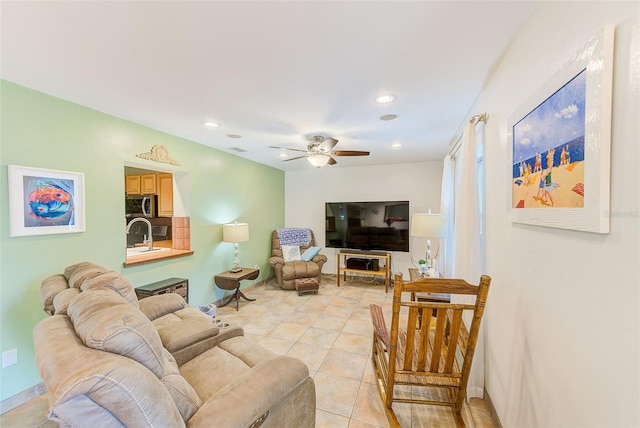 700 16th St NW, Largo, FL 33770 - living room with ceiling fan, light tile patterned floors, and recessed lighting