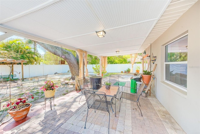 700 16th St NW, Largo, FL 33770 - view of patio / terrace with outdoor dining space and a fenced backyard