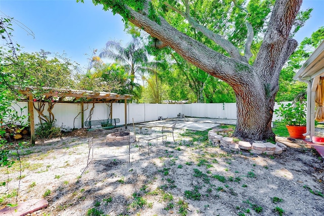 700 16th St NW, Largo, FL 33770 - view of yard featuring a patio area, a fenced backyard, and a pergola