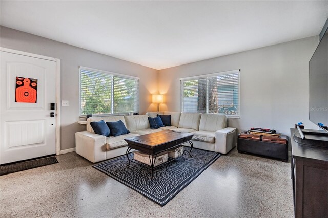 2808 W Lake Ave, Tampa, FL 33607 - living room featuring speckled floor
