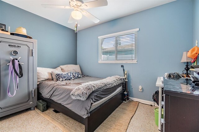 2808 W Lake Ave, Tampa, FL 33607 - bedroom featuring speckled floor, baseboards, a ceiling fan, and fridge