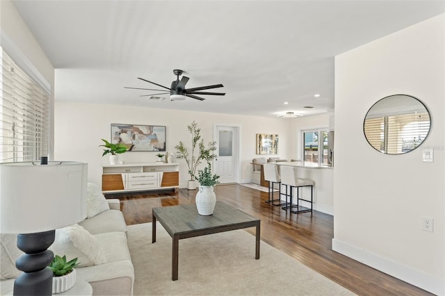 601 Boca Ciega Isle Dr, St Pete Beach, FL 33706 - living room featuring baseboards, wood finished floors, recessed lighting, and a ceiling fan