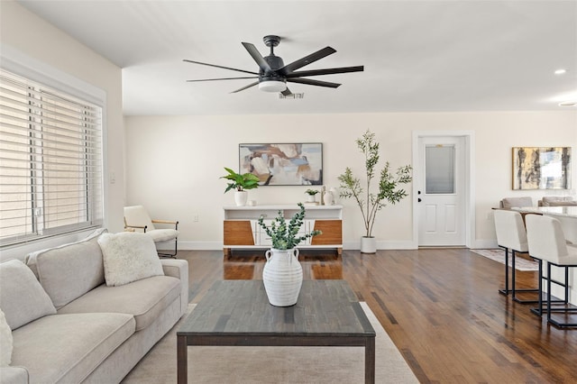 601 Boca Ciega Isle Dr, St Pete Beach, FL 33706 - living room with visible vents, dark wood-style floors, baseboards, and ceiling fan