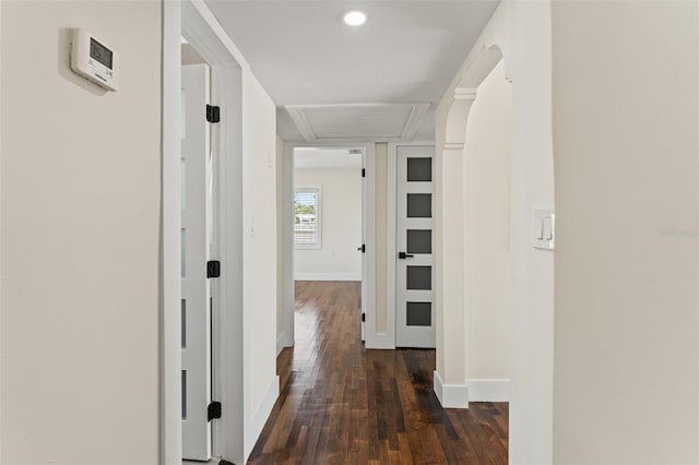 601 Boca Ciega Isle Dr, St Pete Beach, FL 33706 - hallway featuring baseboards, attic access, and dark wood finished floors