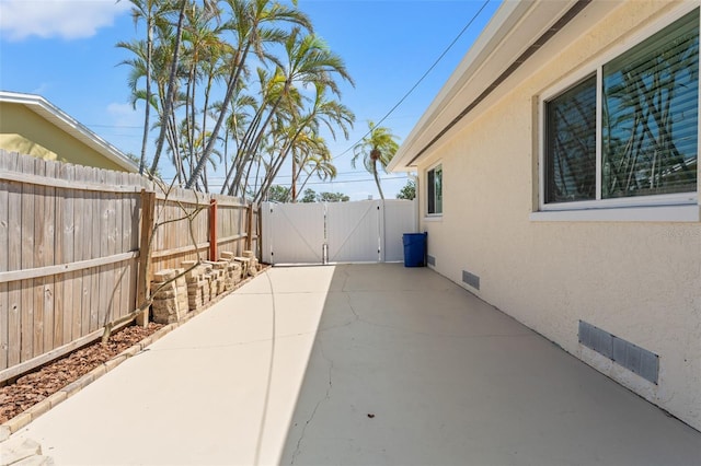 601 Boca Ciega Isle Dr, St Pete Beach, FL 33706 - view of patio / terrace featuring a gate and fence