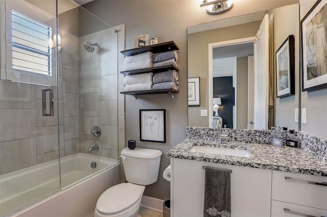 2511 N Grady Ave Unit 82, Tampa, FL 33607 - full bathroom featuring toilet, vanity, enclosed tub / shower combo, and baseboards
