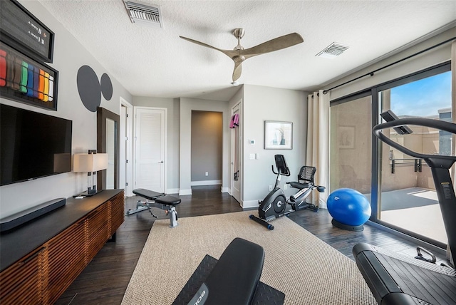 2511 N Grady Ave Unit 82, Tampa, FL 33607 - workout room featuring wood finished floors, ceiling fan, a textured ceiling, and baseboards