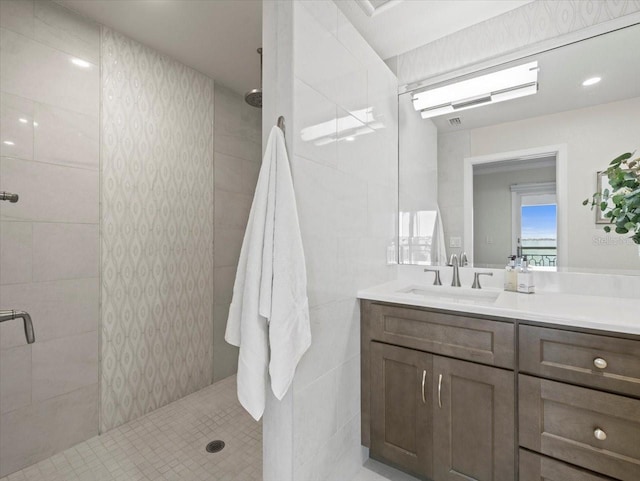 2087 Edgewater Dr Unit C, Clearwater, FL 33755 - full bath with a shower stall, vanity, and tile walls