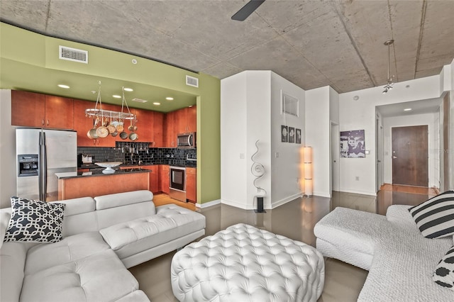 777 N Ashley Dr Unit 2807, Tampa, FL 33602 - living room featuring baseboards, dark wood-style floors, and visible vents