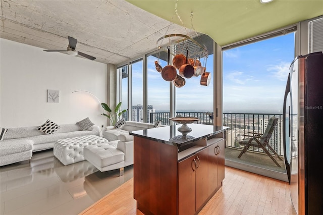 777 N Ashley Dr Unit 2807, Tampa, FL 33602 - sunroom / solarium with hardwood / wood-style floors and a wall of windows