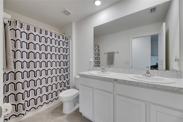 full bath featuring tile patterned flooring, visible vents, a sink, and toilet