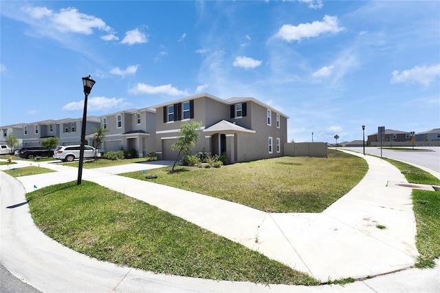 view of side of home with a yard, a garage, stucco siding, a residential view, and driveway