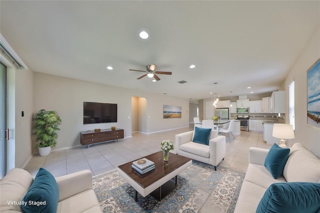 1612 Cabbage Key Dr, Ruskin, FL 33570 - living room featuring light tile patterned flooring, a ceiling fan, recessed lighting, and baseboards