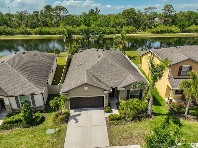 1612 Cabbage Key Dr, Ruskin, FL 33570 - view from above of property featuring a nearby body of water and a tree filled landscape