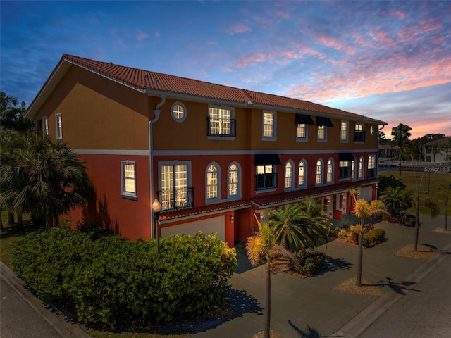 47 W Morgan St, Tarpon Springs, FL 34689 - view of property at dusk