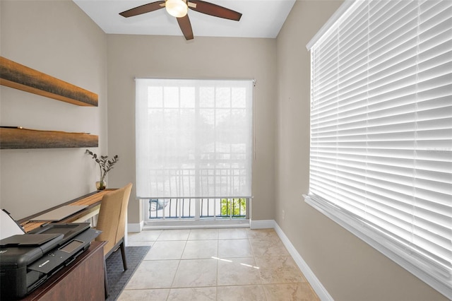 47 W Morgan St, Tarpon Springs, FL 34689 - home office featuring baseboards, ceiling fan, and light tile patterned flooring