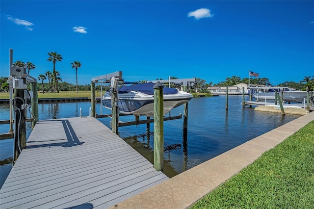 47 W Morgan St, Tarpon Springs, FL 34689 - view of dock featuring boat lift and a water view