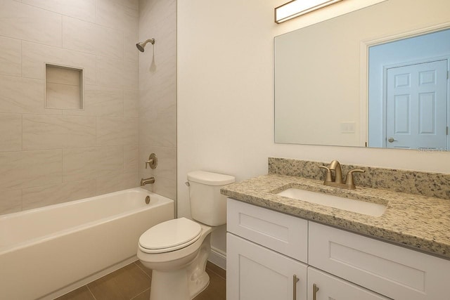 9002 Glenarm Way, Spring Hill, FL 34613 - full bath with toilet, vanity, washtub / shower combination, and tile patterned flooring