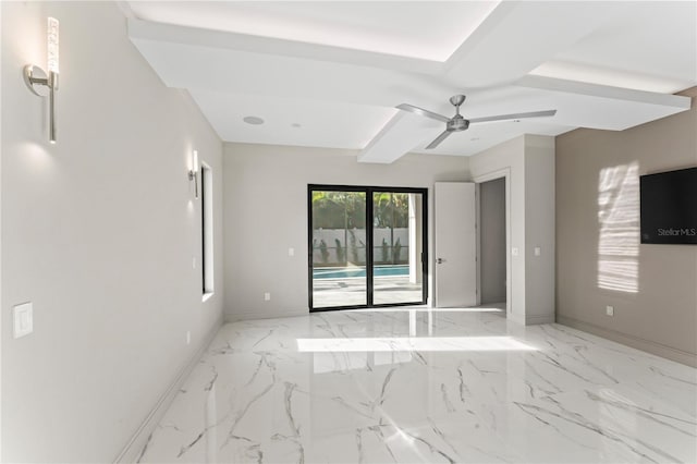 unfurnished room featuring baseboards, marble finish floor, and ceiling fan