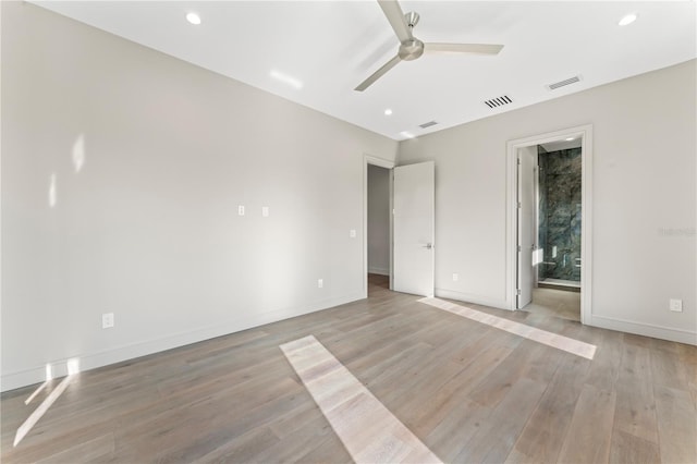 unfurnished bedroom with baseboards, visible vents, recessed lighting, and light wood-type flooring