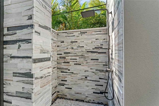exterior space with a textured wall