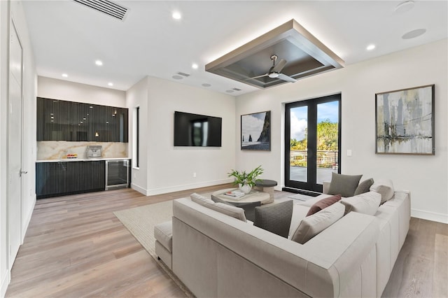3604 W El Prado Blvd, Tampa, FL 33629 - living room featuring light wood-style floors, baseboards, a ceiling fan, and recessed lighting