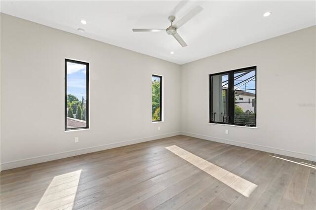 3604 W El Prado Blvd, Tampa, FL 33629 - spare room with healthy amount of natural light, a ceiling fan, light wood finished floors, baseboards, and recessed lighting