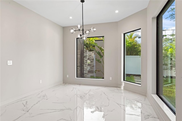 3604 W El Prado Blvd, Tampa, FL 33629 - spare room with light marble finish floors, recessed lighting, a chandelier, and baseboards