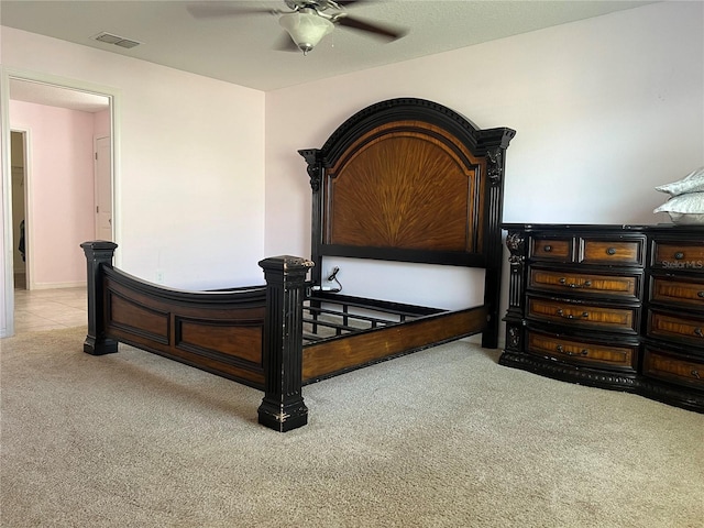 bedroom featuring carpet flooring and a ceiling fan
