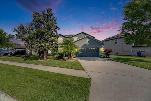 18734 Burndall Ct, Land O Lakes, FL 34638 - ranch-style home with driveway, a garage, and a front yard