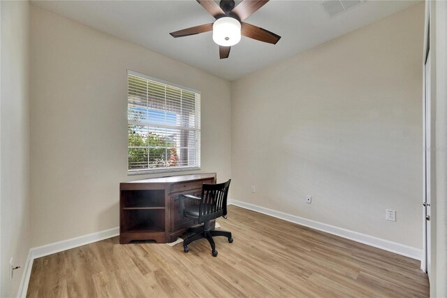 18734 Burndall Ct, Land O Lakes, FL 34638 - unfurnished office with ceiling fan, baseboards, visible vents, and light wood finished floors