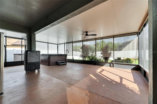 18734 Burndall Ct, Land O Lakes, FL 34638 - sunroom featuring a hot tub, a ceiling fan, and a wealth of natural light