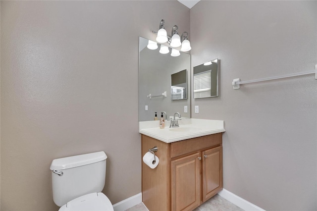 18734 Burndall Ct, Land O Lakes, FL 34638 - bathroom with baseboards, toilet, and vanity