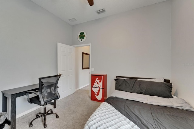 bedroom with visible vents, baseboards, ceiling fan, carpet, and lofted ceiling