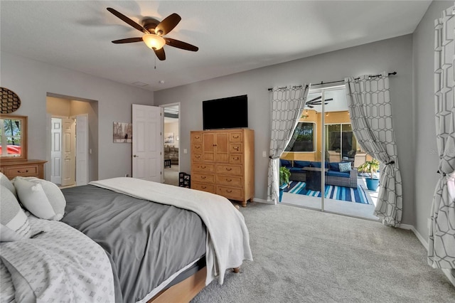 carpeted bedroom with access to outside, multiple windows, baseboards, and a ceiling fan