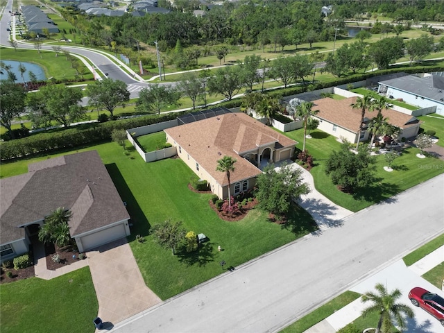 birds eye view of property featuring a residential view and a water view
