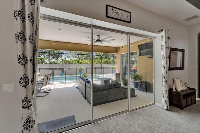 12903 49th Ln E, Parrish, FL 34219 - entryway featuring ceiling fan, carpet, and a sunroom