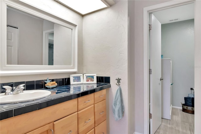 200 Meres Blvd Unit 7, Tarpon Springs, FL 34689 - bathroom featuring vanity and baseboards