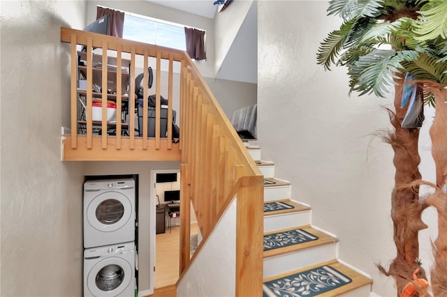 200 Meres Blvd Unit 7, Tarpon Springs, FL 34689 - staircase with estacked washer and dryer