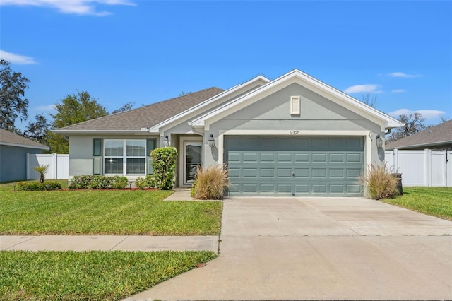 16302 Vine Cliff Ave, Hudson, FL 34667 - ranch-style house featuring stucco siding, fence, a front lawn, and concrete driveway