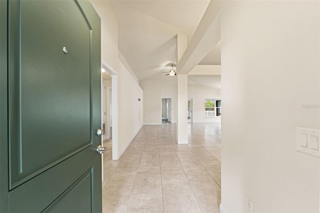 16302 Vine Cliff Ave, Hudson, FL 34667 - foyer featuring baseboards, lofted ceiling, ceiling fan, and light tile patterned floors