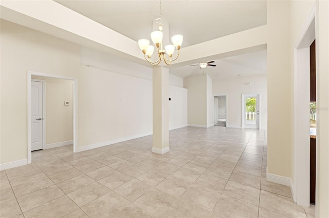 16302 Vine Cliff Ave, Hudson, FL 34667 - unfurnished room with light tile patterned floors, ceiling fan with notable chandelier, baseboards, and a raised ceiling