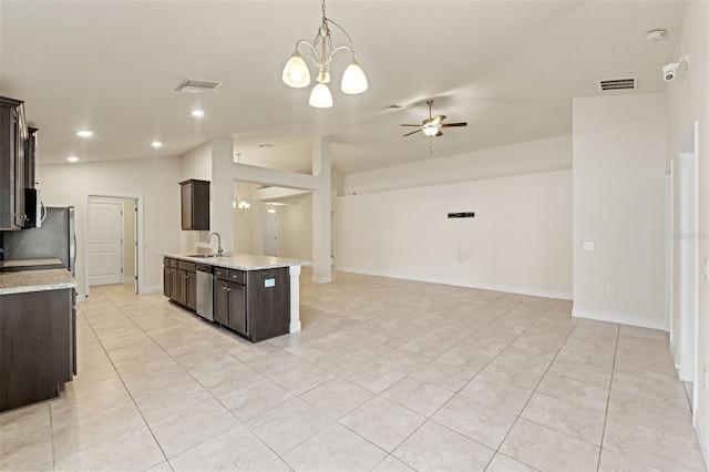 16302 Vine Cliff Ave, Hudson, FL 34667 - kitchen featuring a sink, stainless steel dishwasher, open floor plan, ceiling fan with notable chandelier, and dark brown cabinets