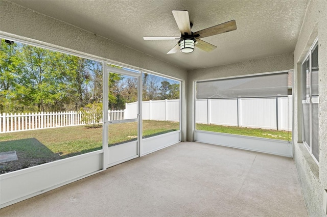16302 Vine Cliff Ave, Hudson, FL 34667 - unfurnished sunroom featuring a ceiling fan