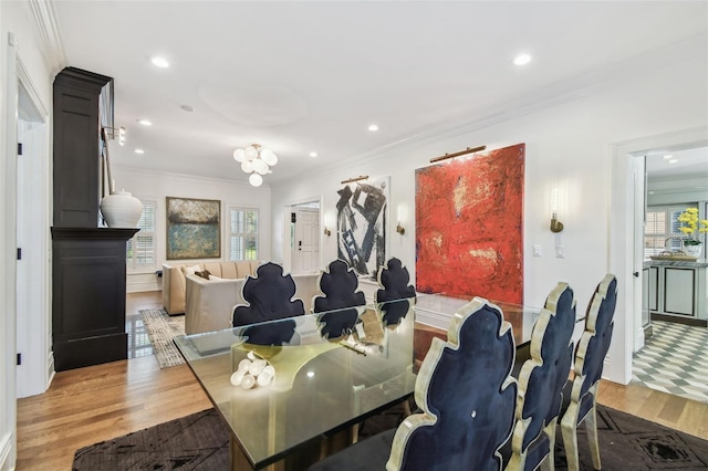 3313 W Mullen Ave, Tampa, FL 33609 - dining room featuring ornamental molding, recessed lighting, light wood-type flooring, and plenty of natural light