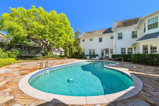 3313 W Mullen Ave, Tampa, FL 33609 - pool featuring french doors and a patio area