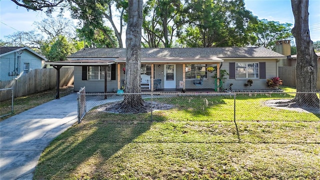 9616 Oak Ridge Ave, Riverview, FL 33578 - ranch-style house with a chimney, driveway, fence, and a front lawn